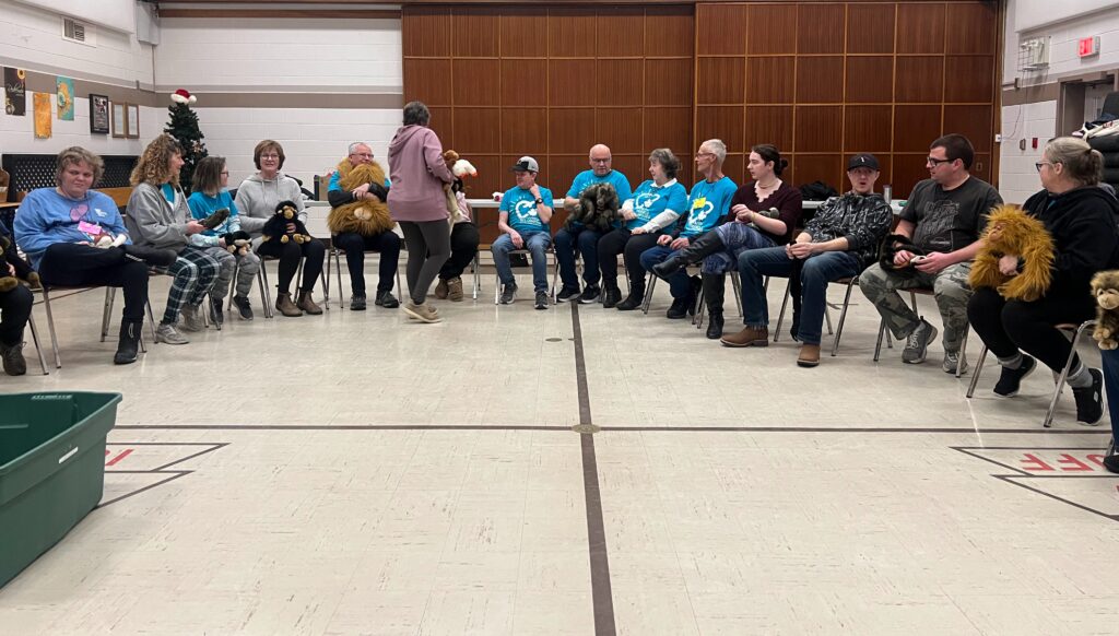 Group seated in a circle in the church fellowship hall