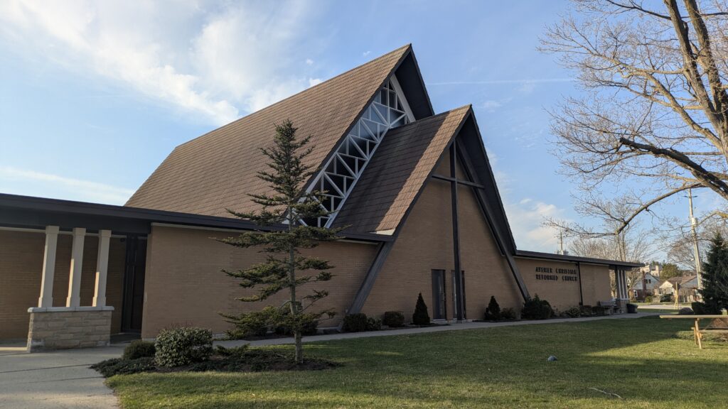Exterior of the Aylmer Christian Reformed Church building on a clear day